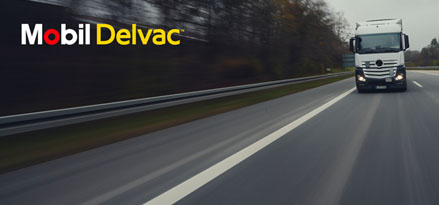 Lorry driving along a road – Mobil Delvac