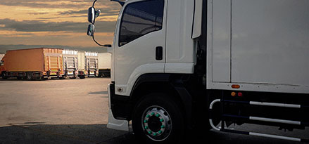 Commercial fleet lorry in a lot with other lorries